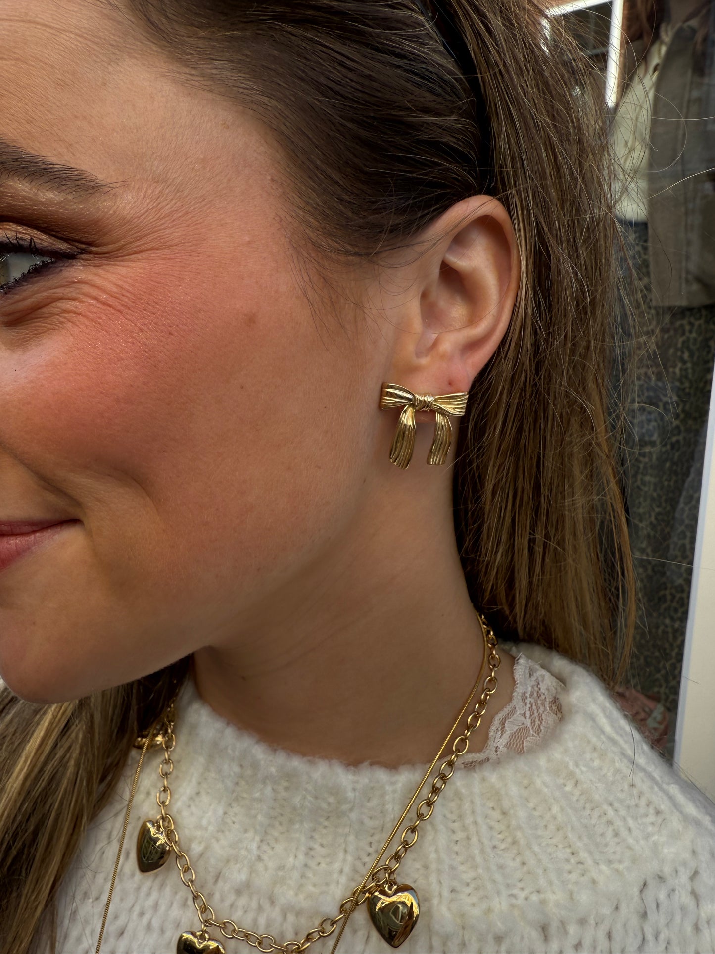 Strikjes oorbellen goud - Project 35