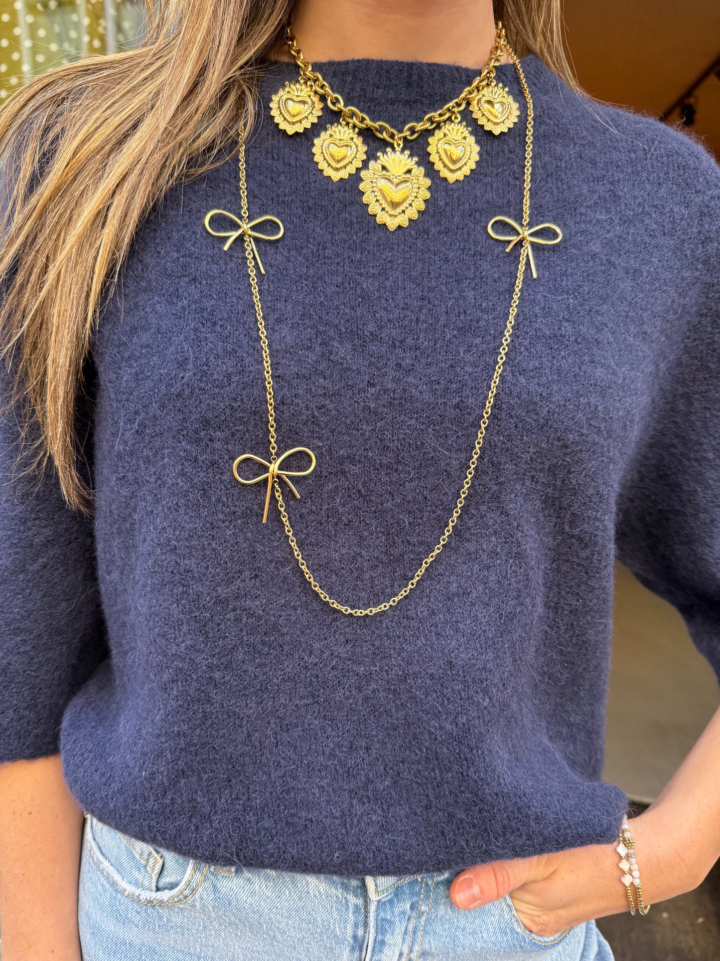 'Bow' ketting lang goud