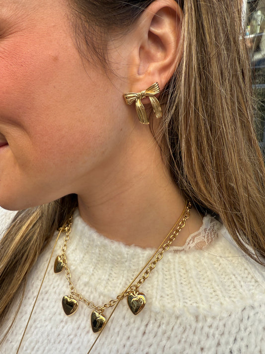 Strikjes oorbellen goud - Project 35