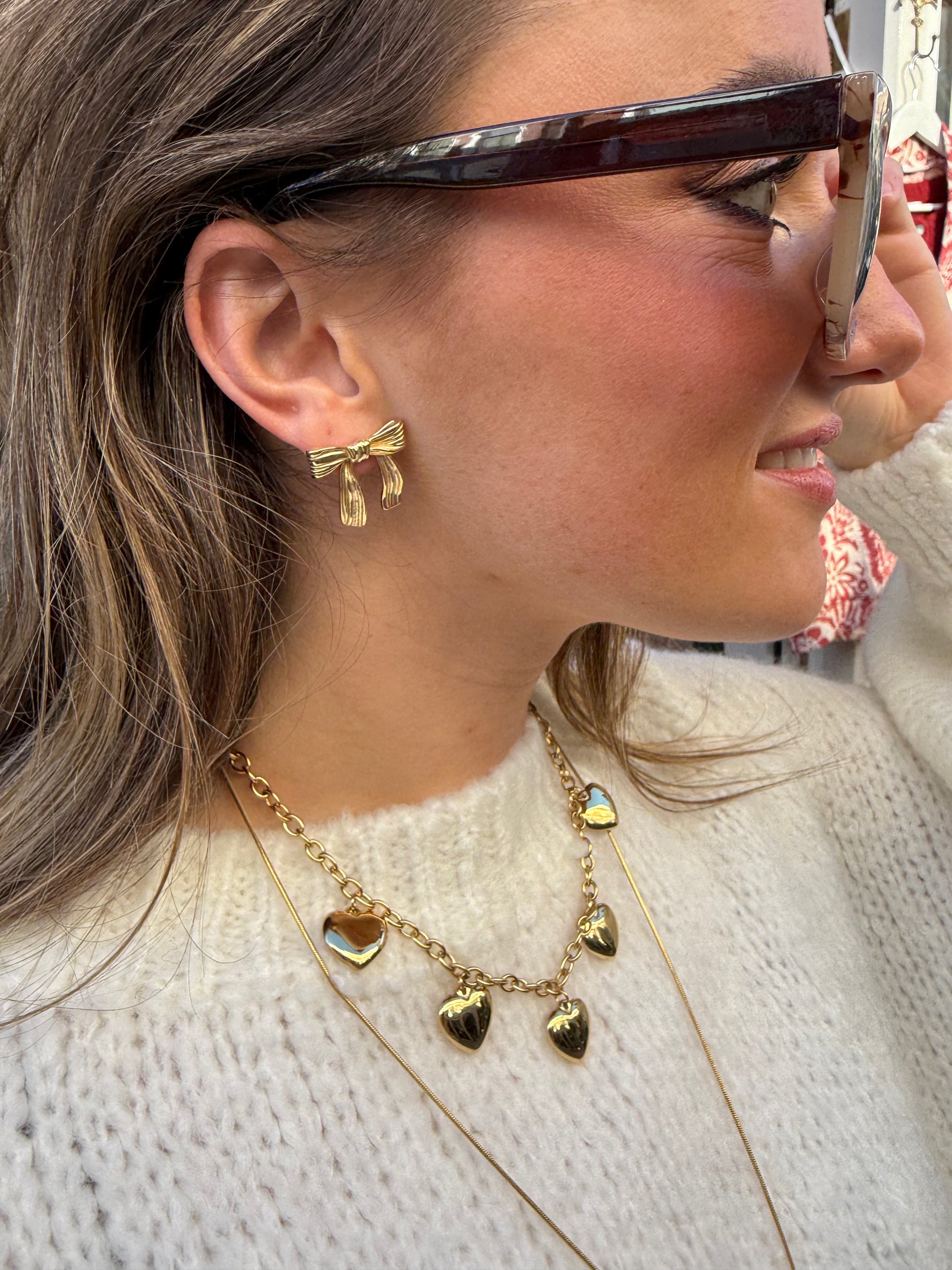 Strikjes oorbellen goud - Project 35