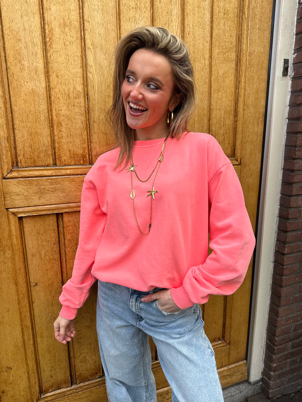 Cato oversized katoenen sweater koraal roze
