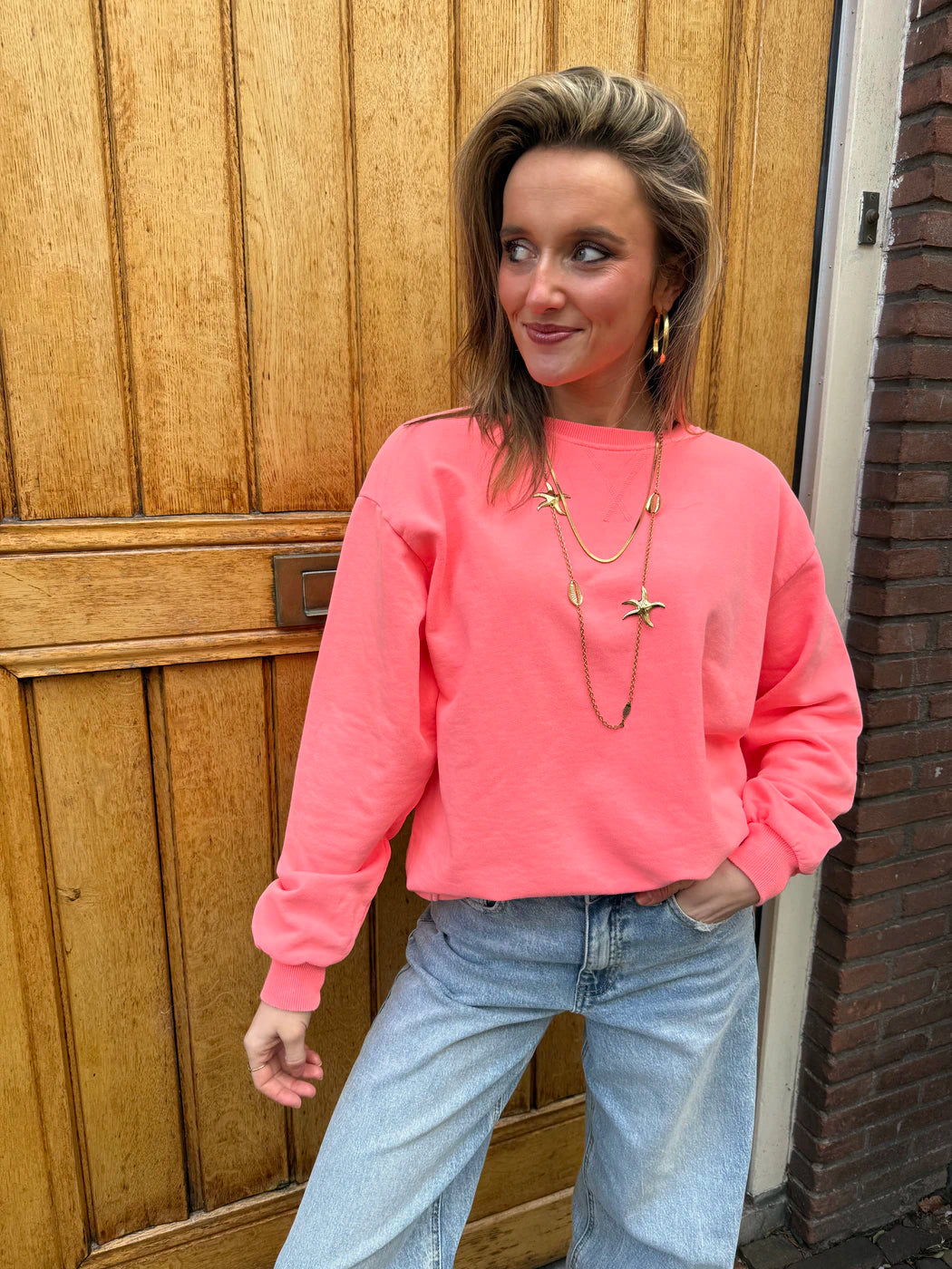 Cato oversized katoenen sweater koraal roze