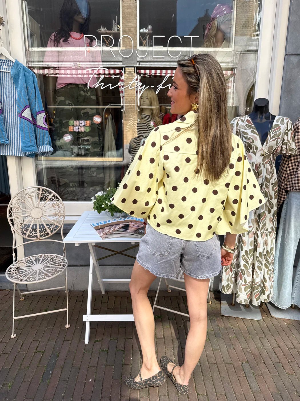 Yara denim blouse uitlopende mouw polkadot geel/bruin - Project 35